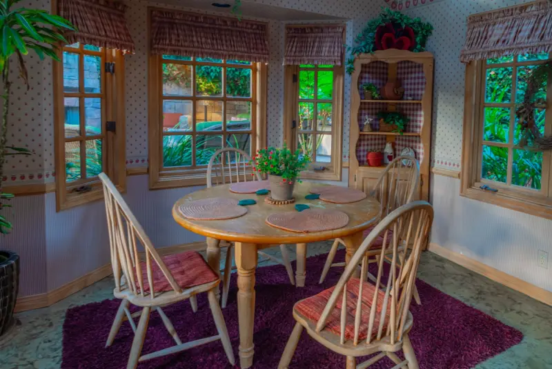 The octagonal breakfast room with French windows on every side at The Enchanted Manor