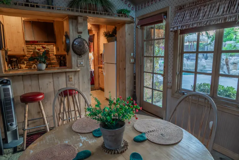 The breakfast room opening onto the kitchen at The Enchanted Manor