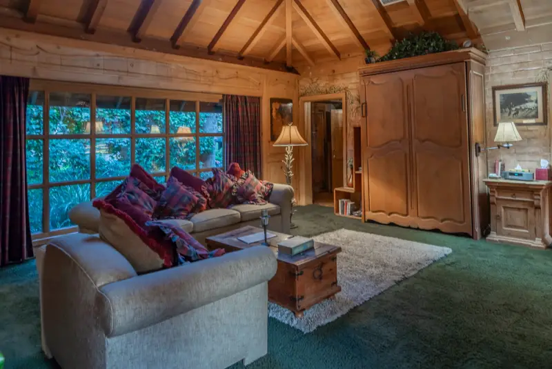 Garden windows along the Inn living room at The Enchanted Manor