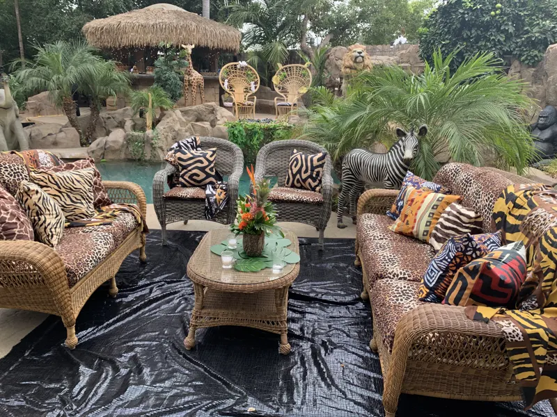 A lounge set dressed on the deck at The Enchanted Manor