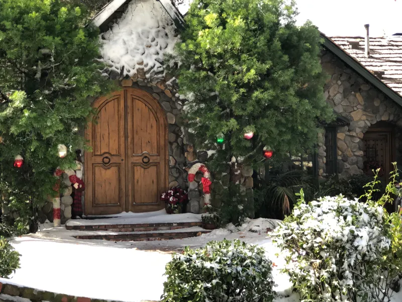 The arched front doors at The Enchanted Manor