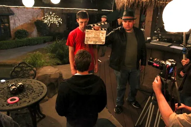 Clapperboard on the courtyard patio at The Enchanted Manor