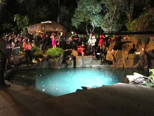 A night shoot around the lit pool at The Enchanted Manor
