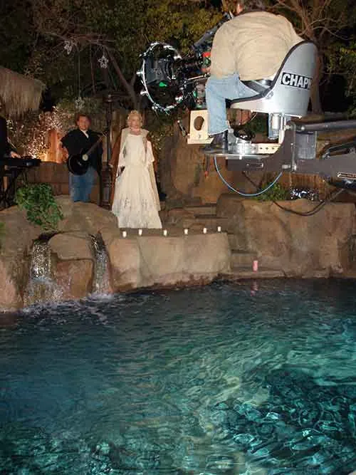 A camera rig above the grotto at night at The Enchanted Manor