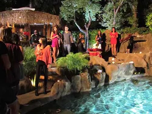 Cast and crew on the deck at night at The Enchanted Manor